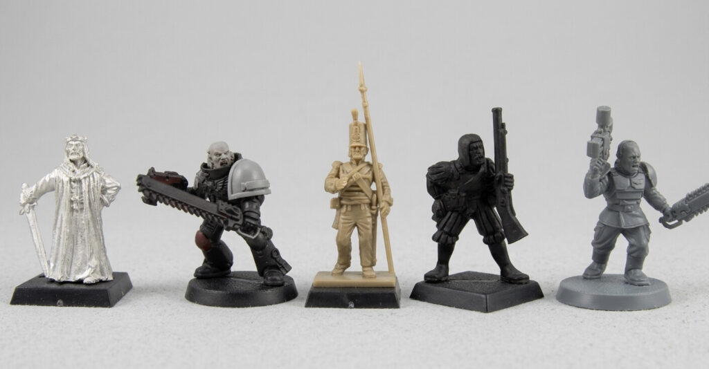 True scale vs heroic scale miniatures comparison highlighting anatomical differences
