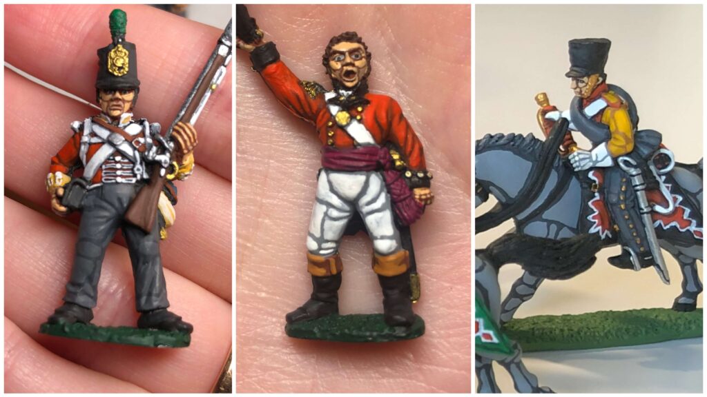 Close-up of painted historical miniatures showing "lining" effects between straps, uniforms, and equipment to improve visual readability.