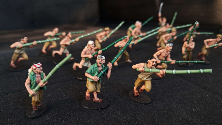 28mm WW2 Late-war volunteer fighters miniatures armed with bamboo spears, featuring realistic skin tones and crisp freehand headband details.