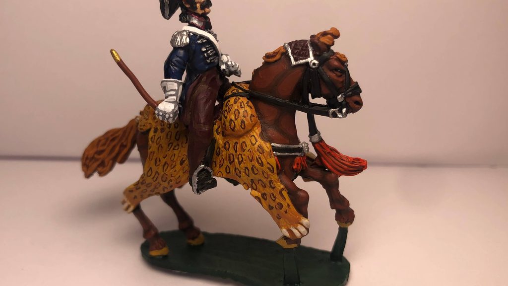 Painted leopard-skin detail on a historical cavalry miniature
